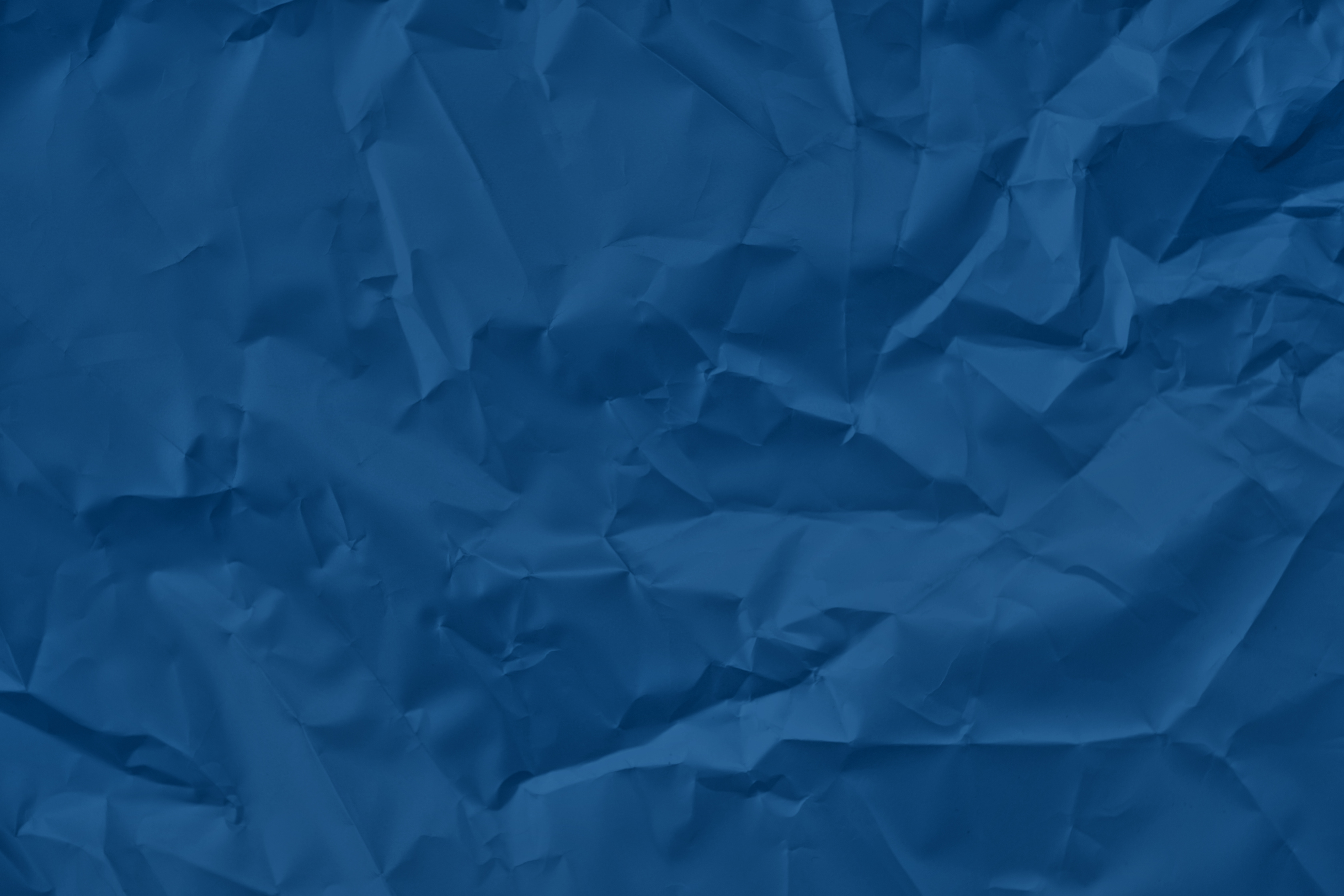 Crumpled blue satin paper texture